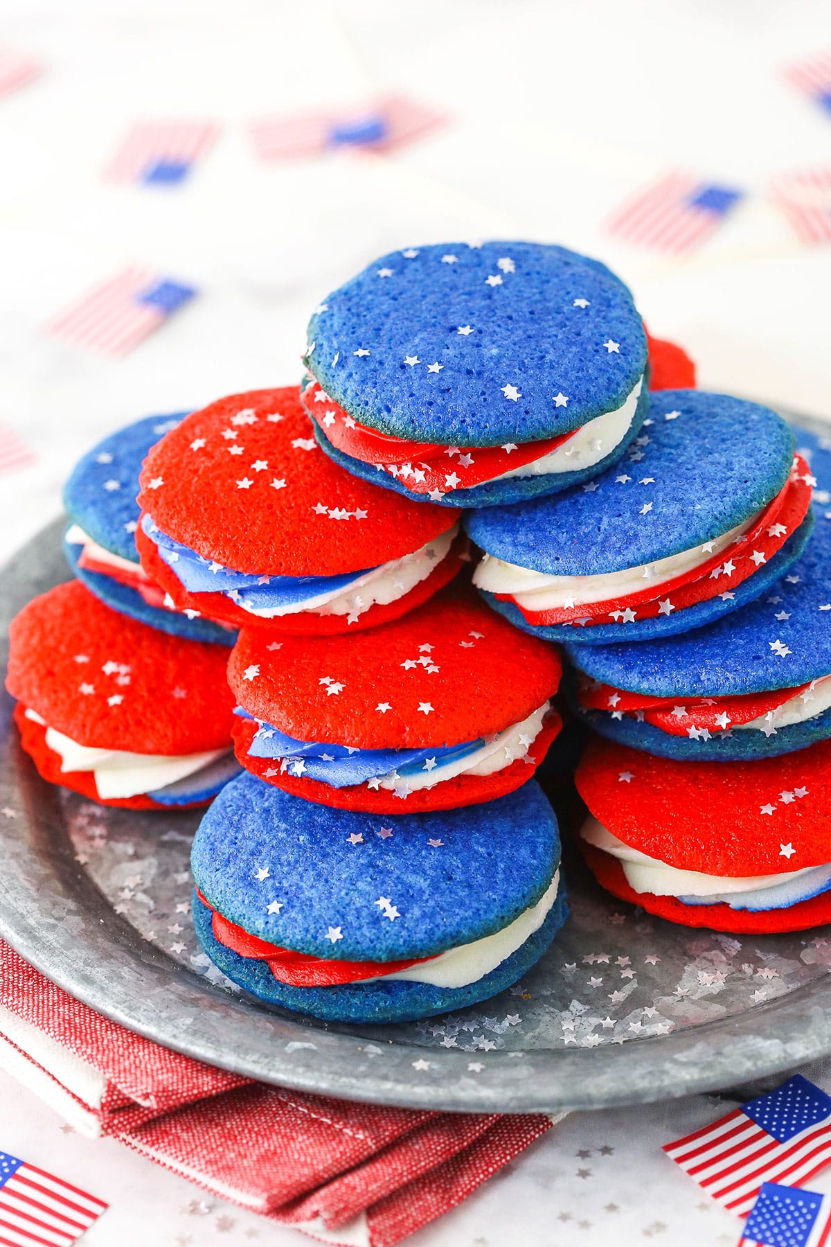 red, white and blue cookies on a silver plate - overhead image