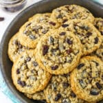 Overhead view of a grey plate stacked with homemade Oatmeal Raisin Cookies