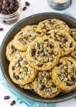 Overhead view of a grey plate stacked with homemade Oatmeal Raisin Cookies