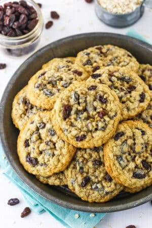 Overhead view of a grey plate stacked with homemade Oatmeal Raisin Cookies