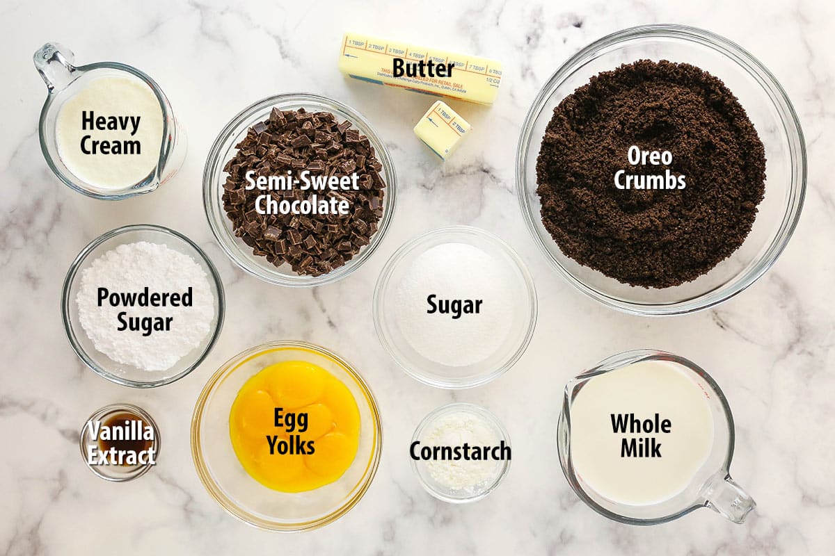 Ingredients for chocolate cream pie separated into bowls and labeled.