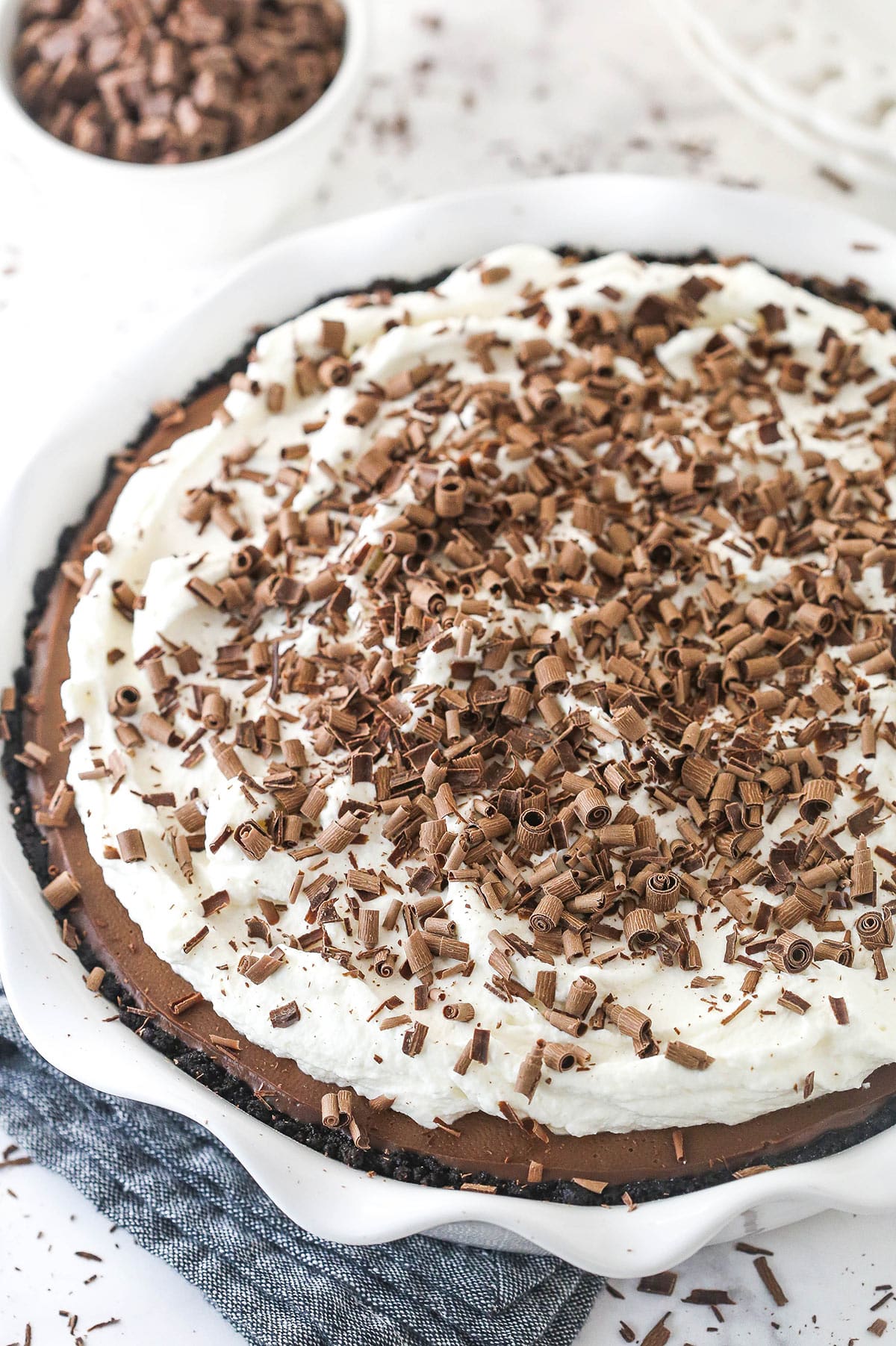 Chocolate cream pie in a pie dish.