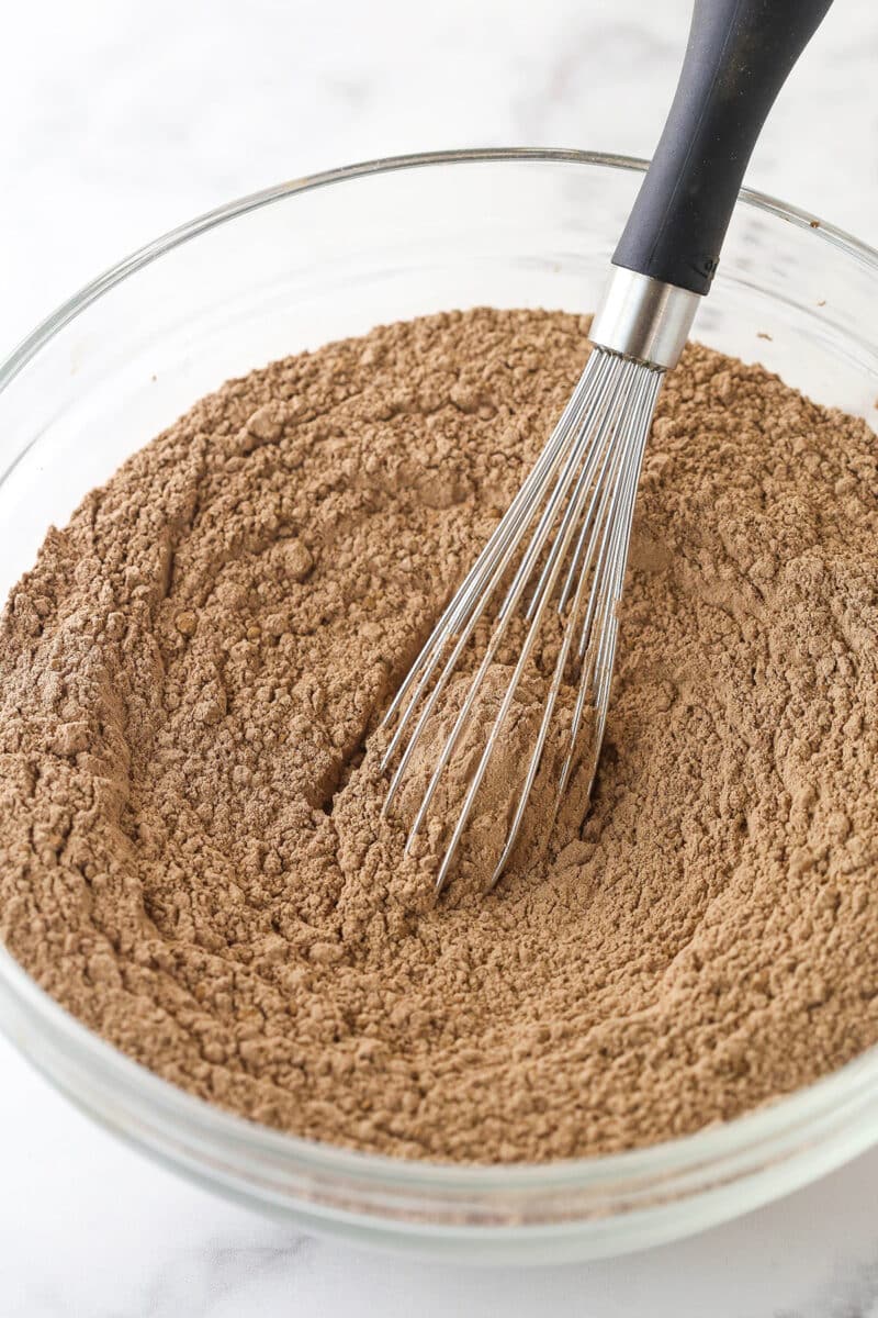 Whisking together dry ingredients for chocolate pound cake.