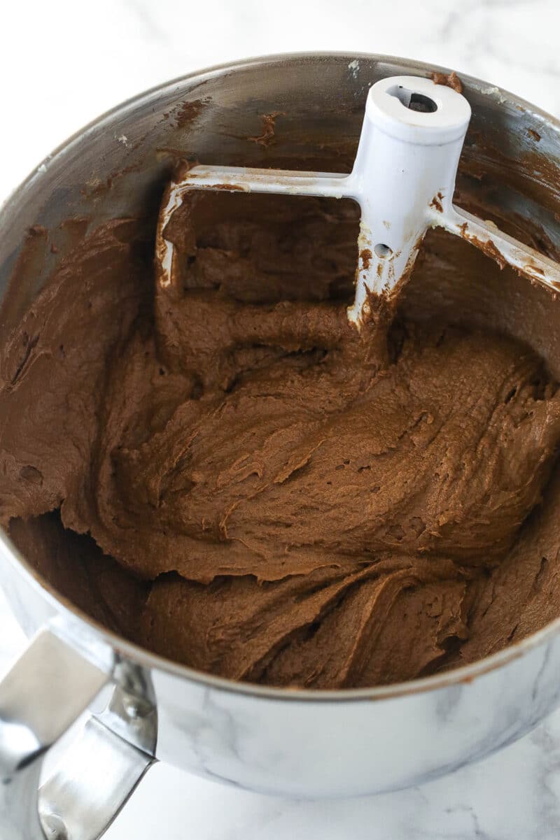 Chocolate pound cake batter in a mixing bowl.