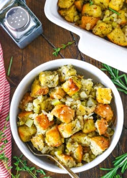 Classic Homemade Stuffing in a white bowl with a silver spoon