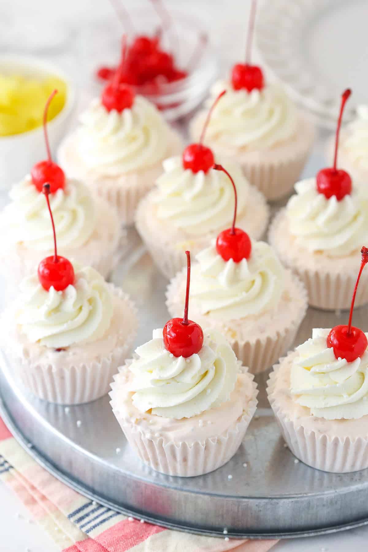 Frozen fruit salad cupcakes on a serving platter.