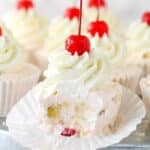 Closeup of a frozen fruit salad cupcake with a bite taken out of it.