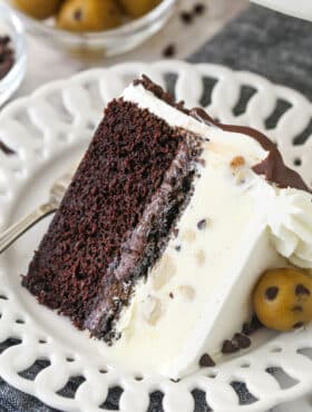 Overhead of a slice of ice cream cake on a plate.