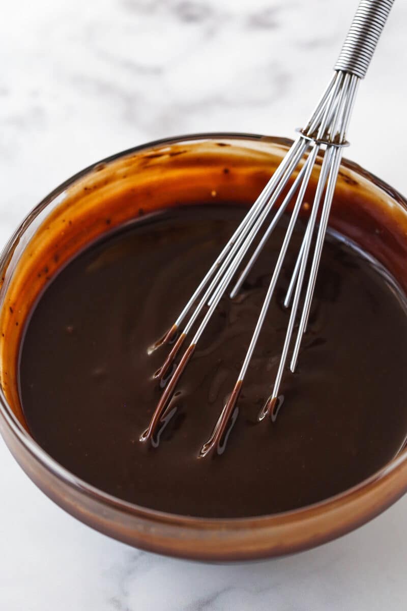 Whisking chocolate fudge.