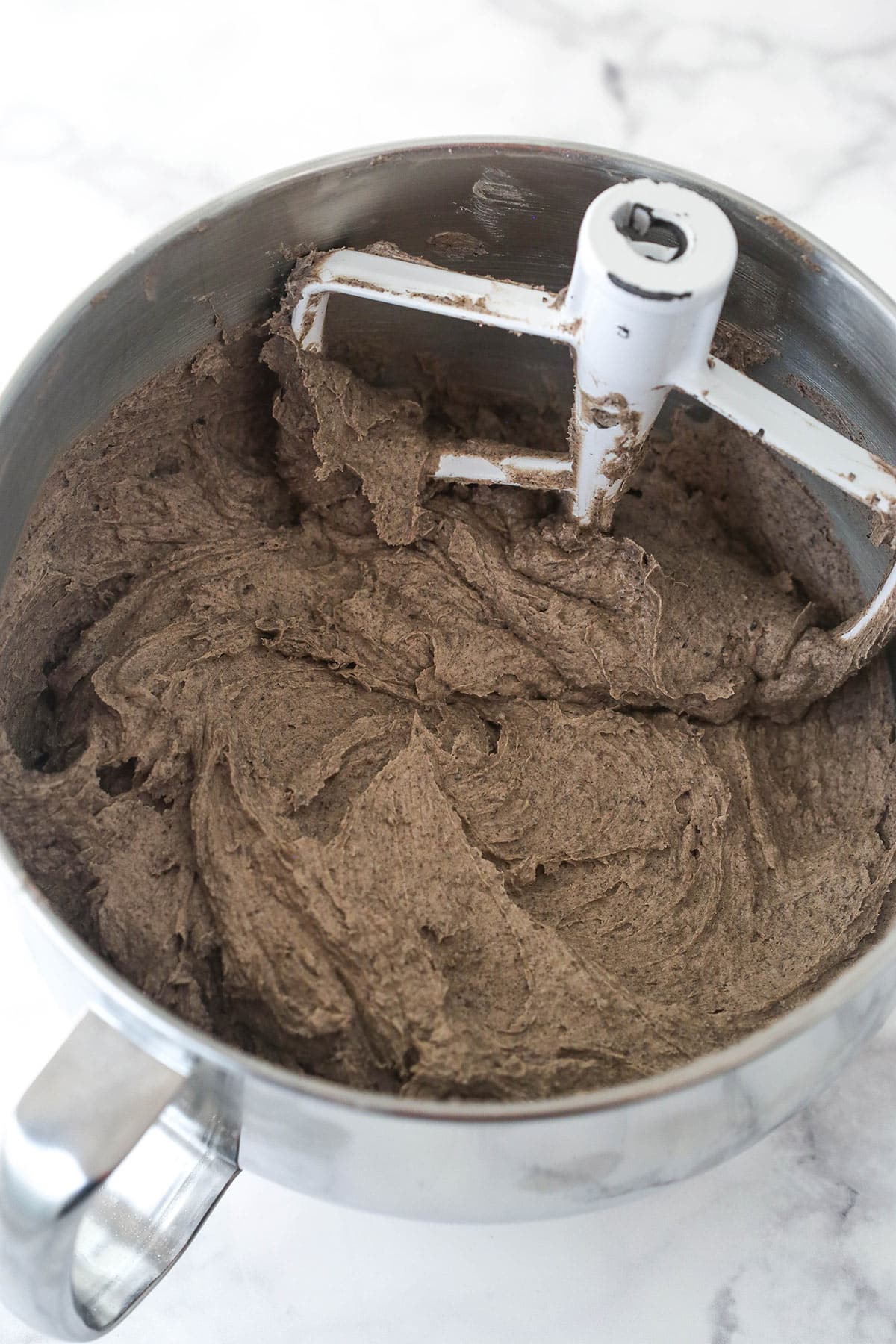 Mixing Oreo buttercream frosting.
