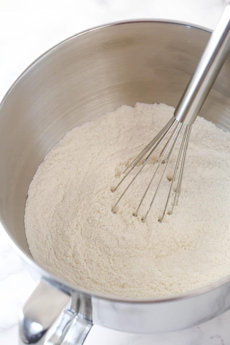 Whisking together dry ingredients for cake batter.