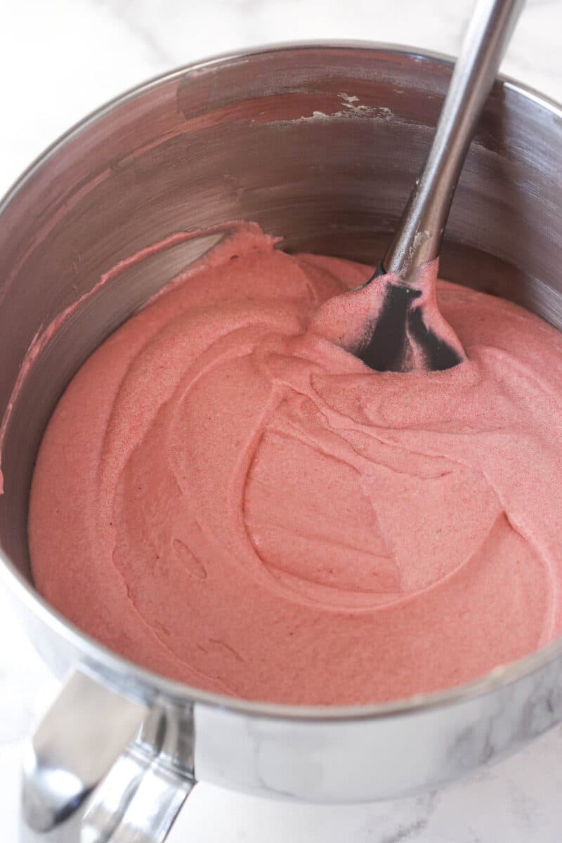 Strawberry cake batter in a mixing bowl.