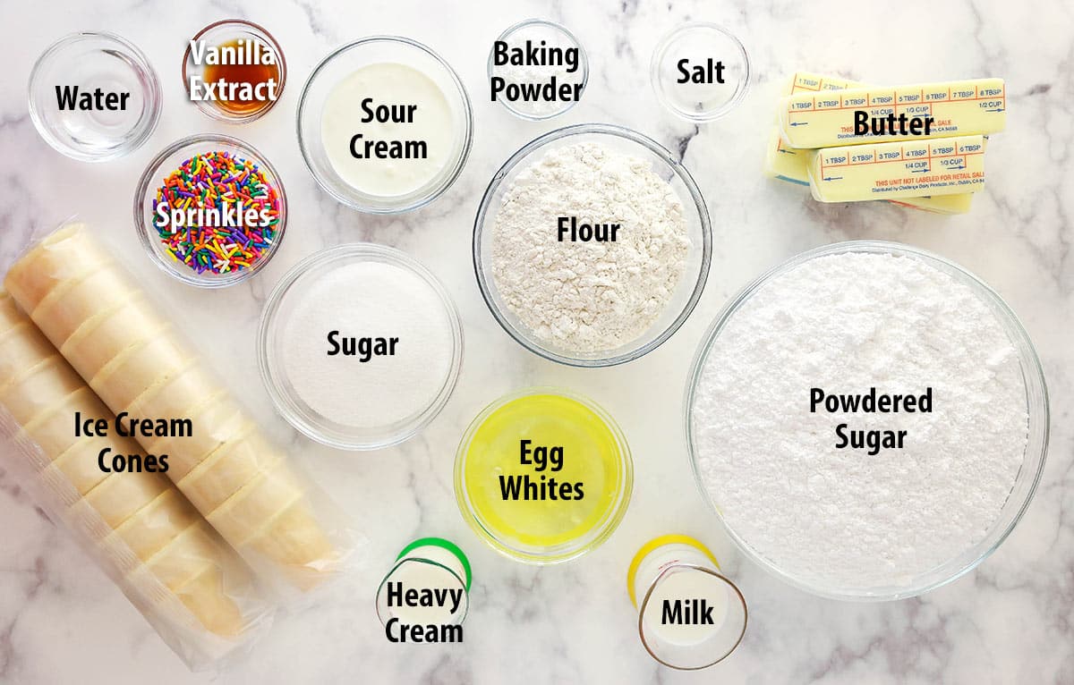 Ingredients for ice cream cone cupcakes separated into bowls.