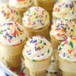 Overhead of ice cream cone cupcakes on a serving tray.