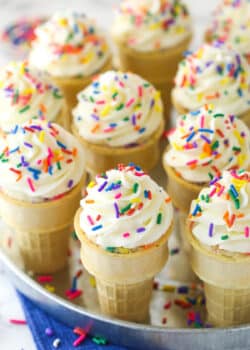 Overhead of ice cream cone cupcakes on a serving tray.