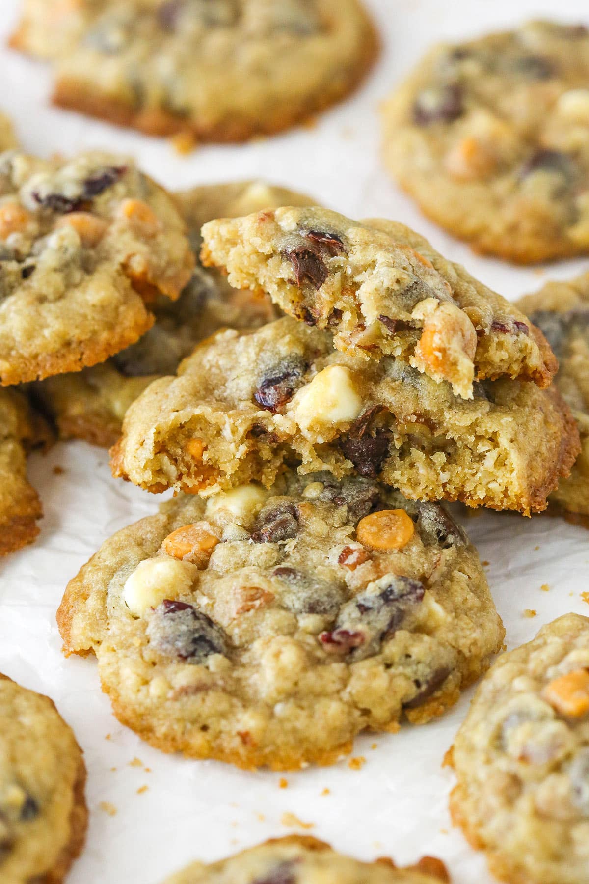 Close up of kitchen sink cookies. One is torn in two.