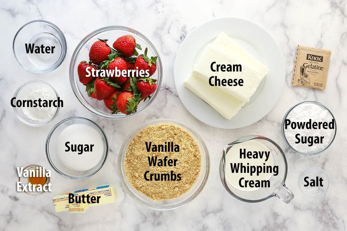 Ingredients for no bake strawberry cheesecake separated into bowls.