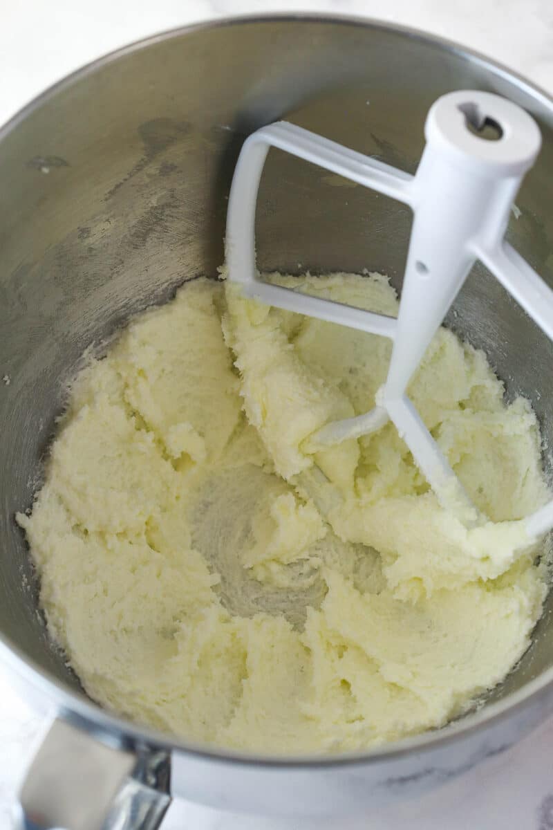 Creaming together butter and sugar for cupcake batter.