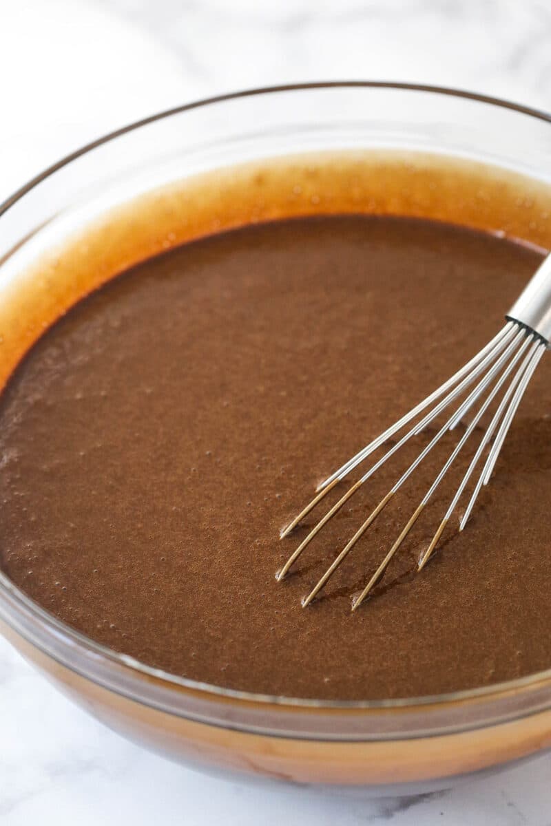 Chocolate cake batter in a mixing bowl.