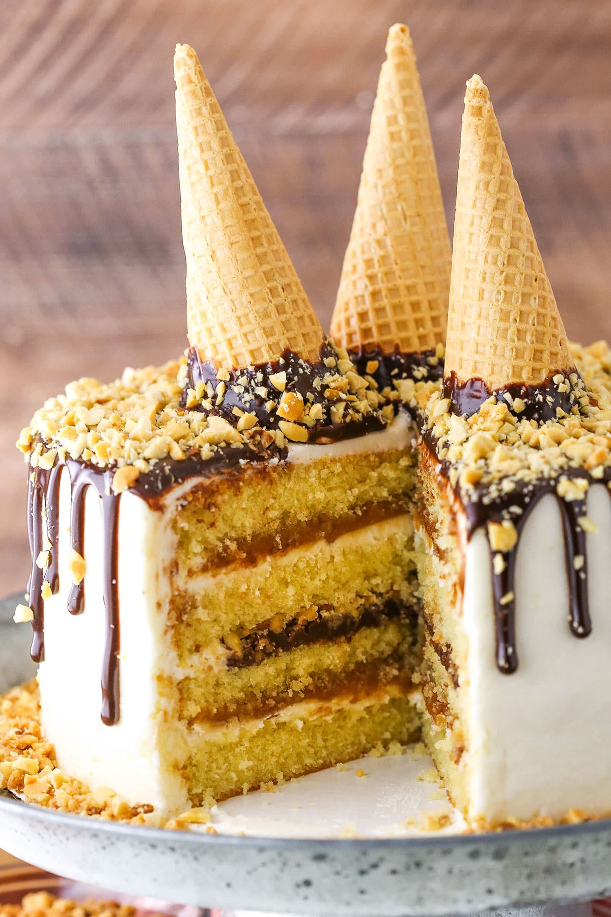 Drumstick Layer Cake with a large serving removed showing the internal layers