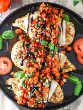 Overhead view of Bruschetta Chicken in a black pan