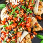 Bruschetta Chicken in a black pan