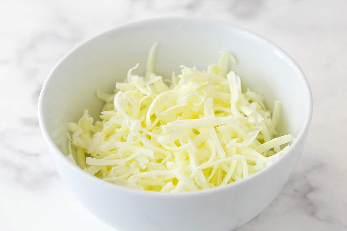 shredded butter in a white bowl