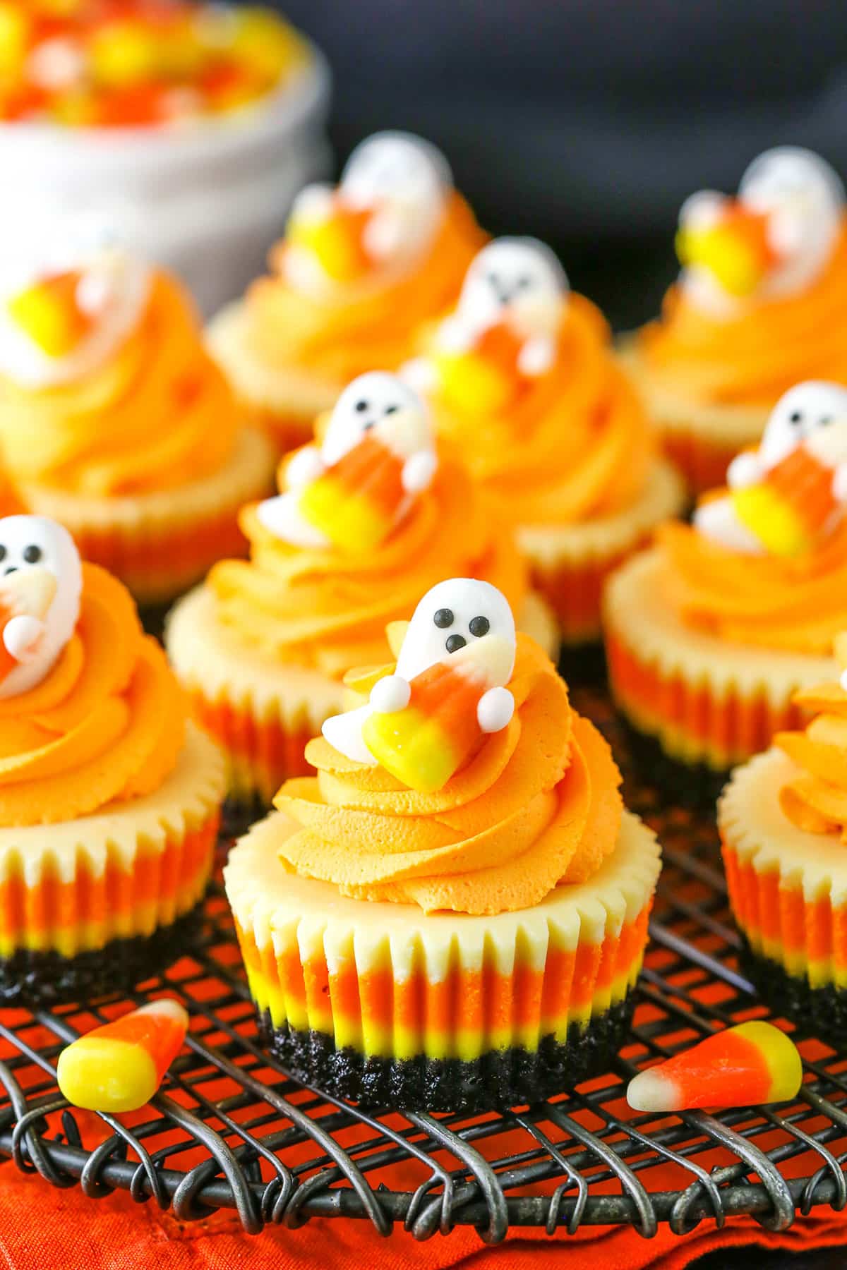 Mini Candy Corn Cheesecakes on a metal stand