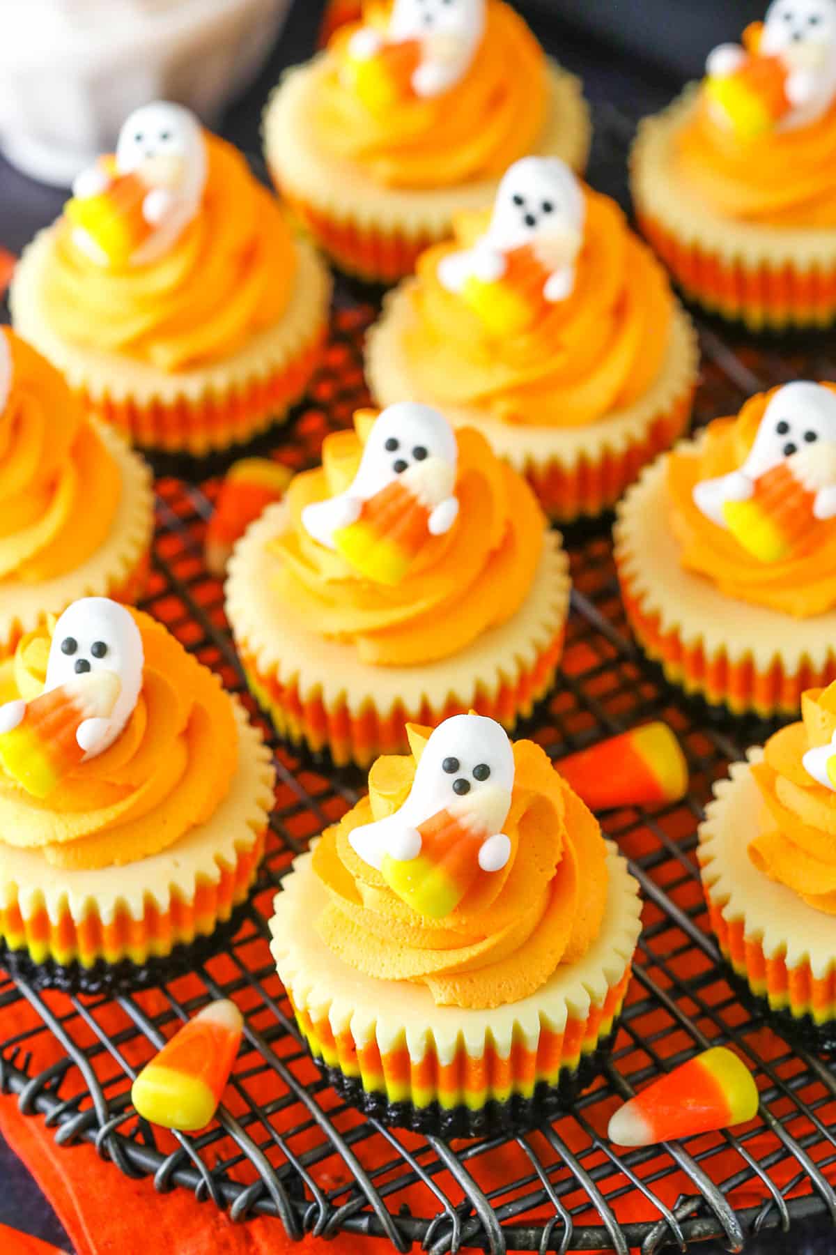 Overhead view of Mini Candy Corn Cheesecakes on a metal stand