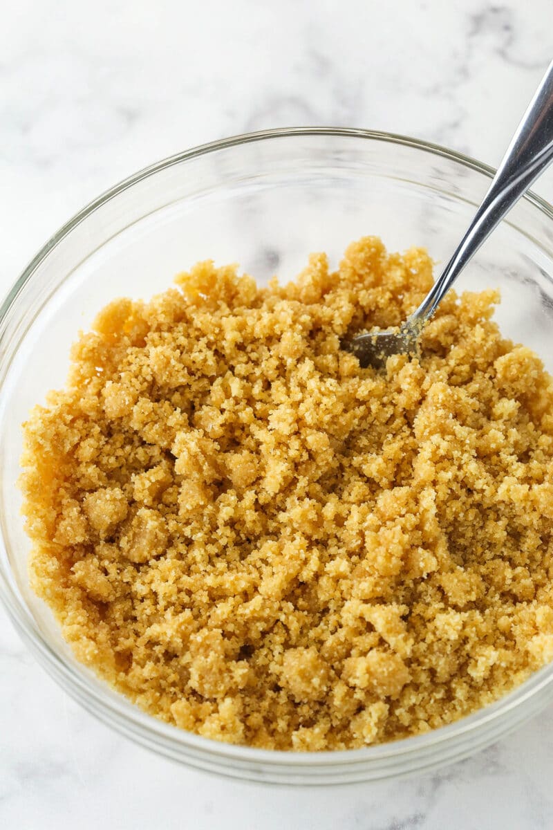 Mixing together ingredients for a vanilla wafer crust.