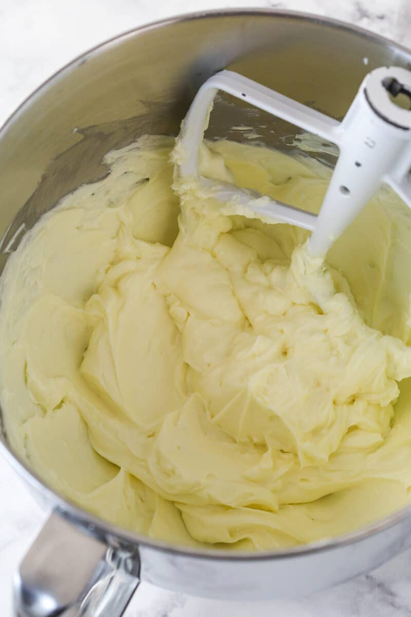 Beating cream cheese and sugar together until smooth.