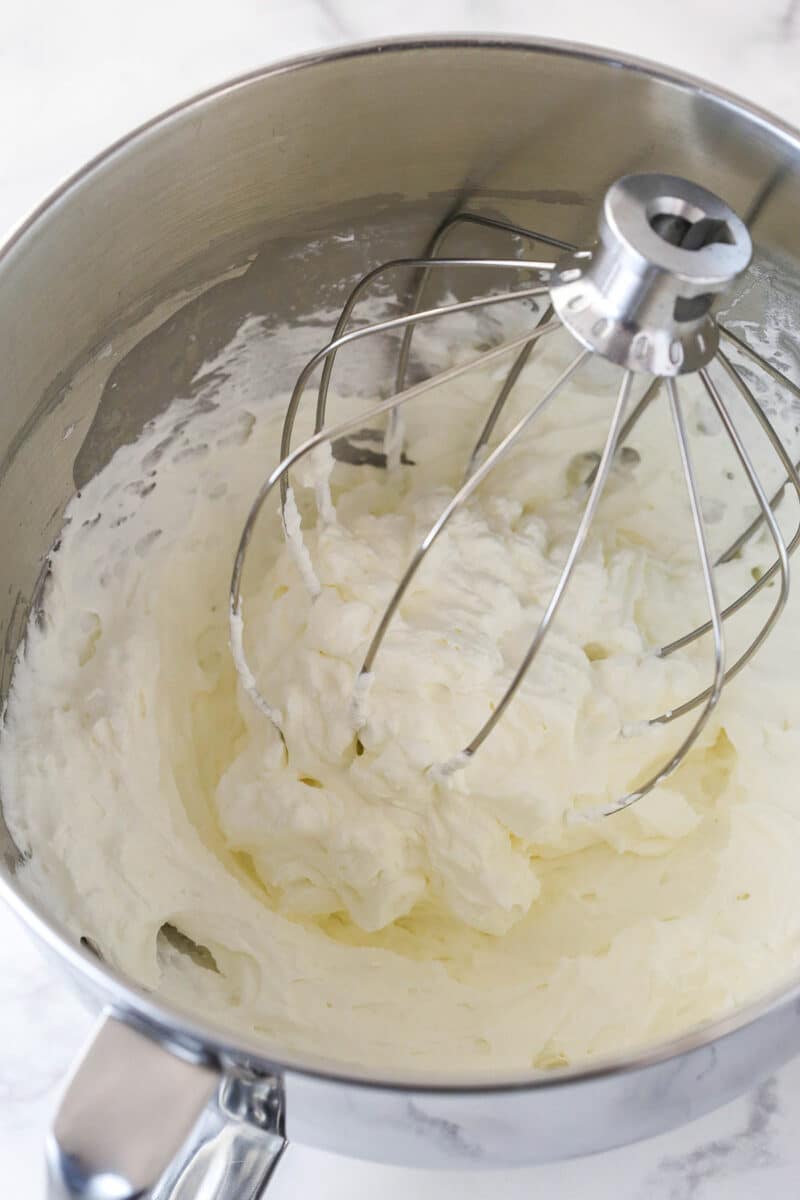 Making whipped cream for no bake cheesecake filling.