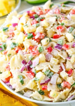 Pineapple Salsa Pasta Salad in a white bowl on a white table