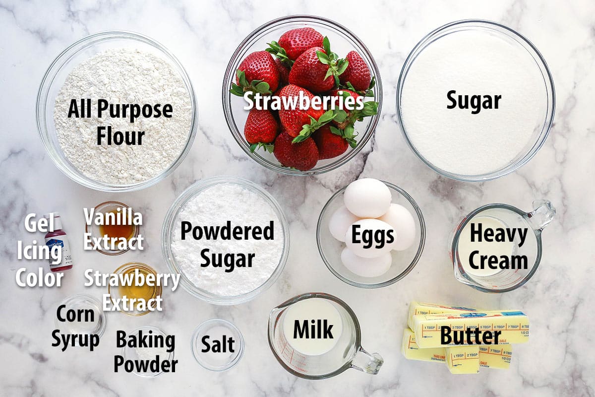 Ingredients for strawberry pound cake separated into bowls.