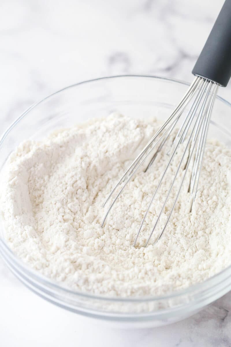 Whisking together dry ingredients for cake batter.