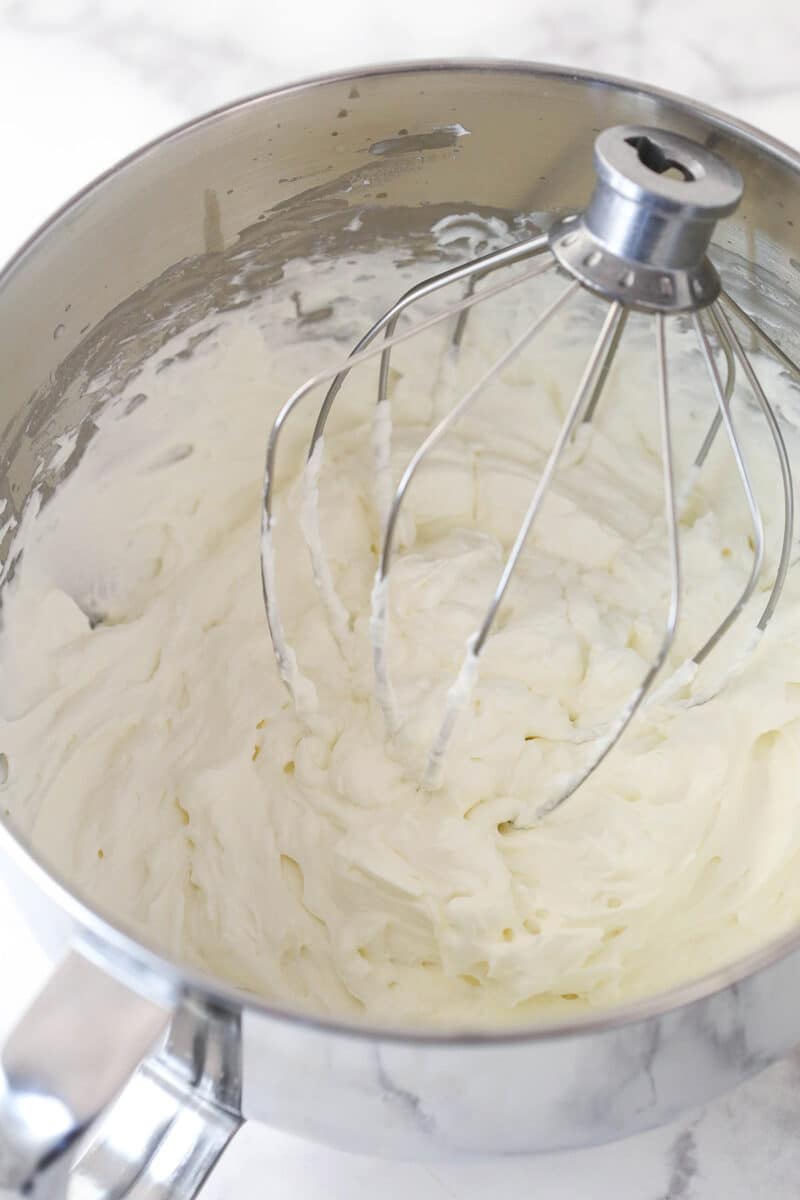 Making whipped cream in a mixing bowl.