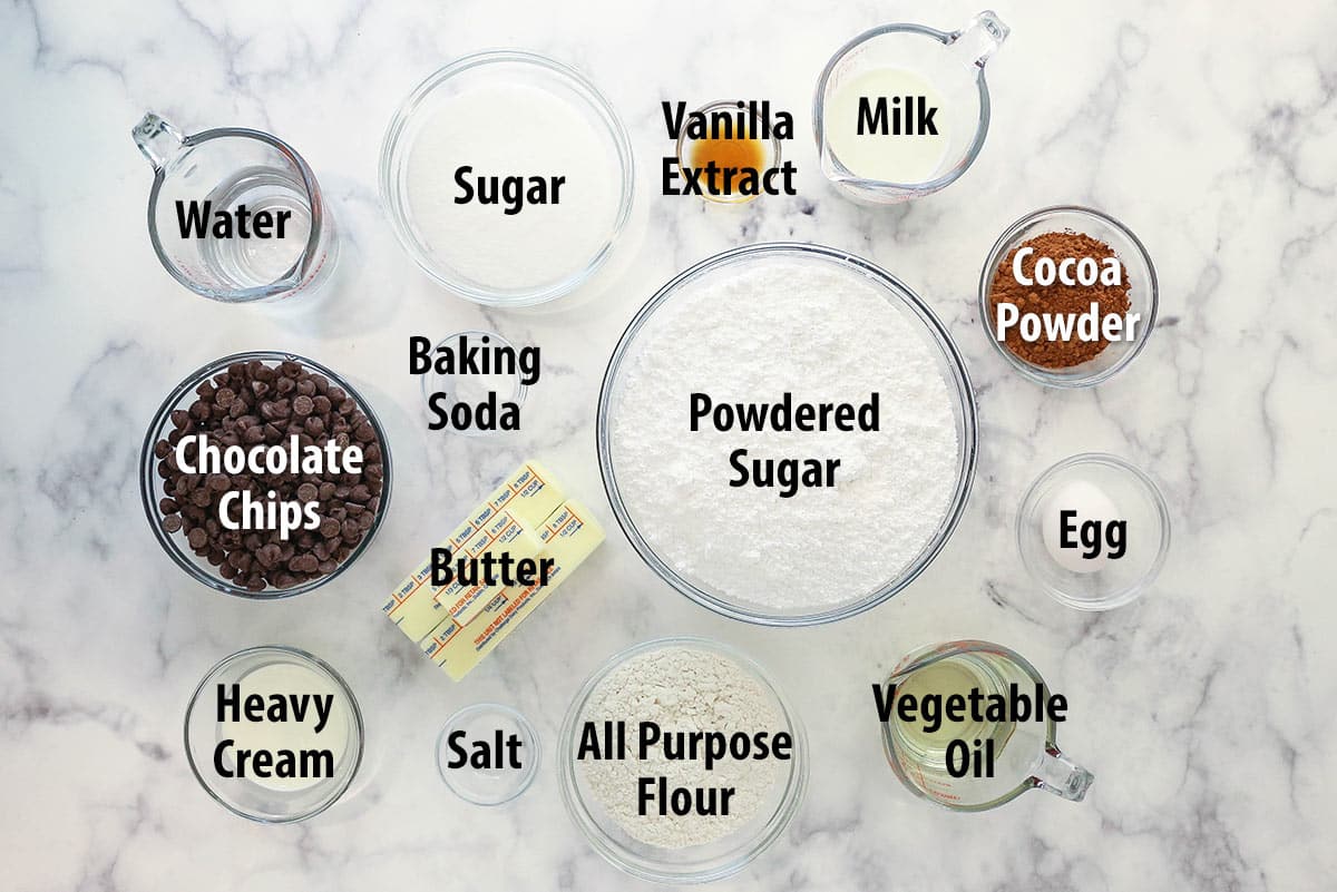Ingredients for moist chocolate cupcakes separated into bowls.