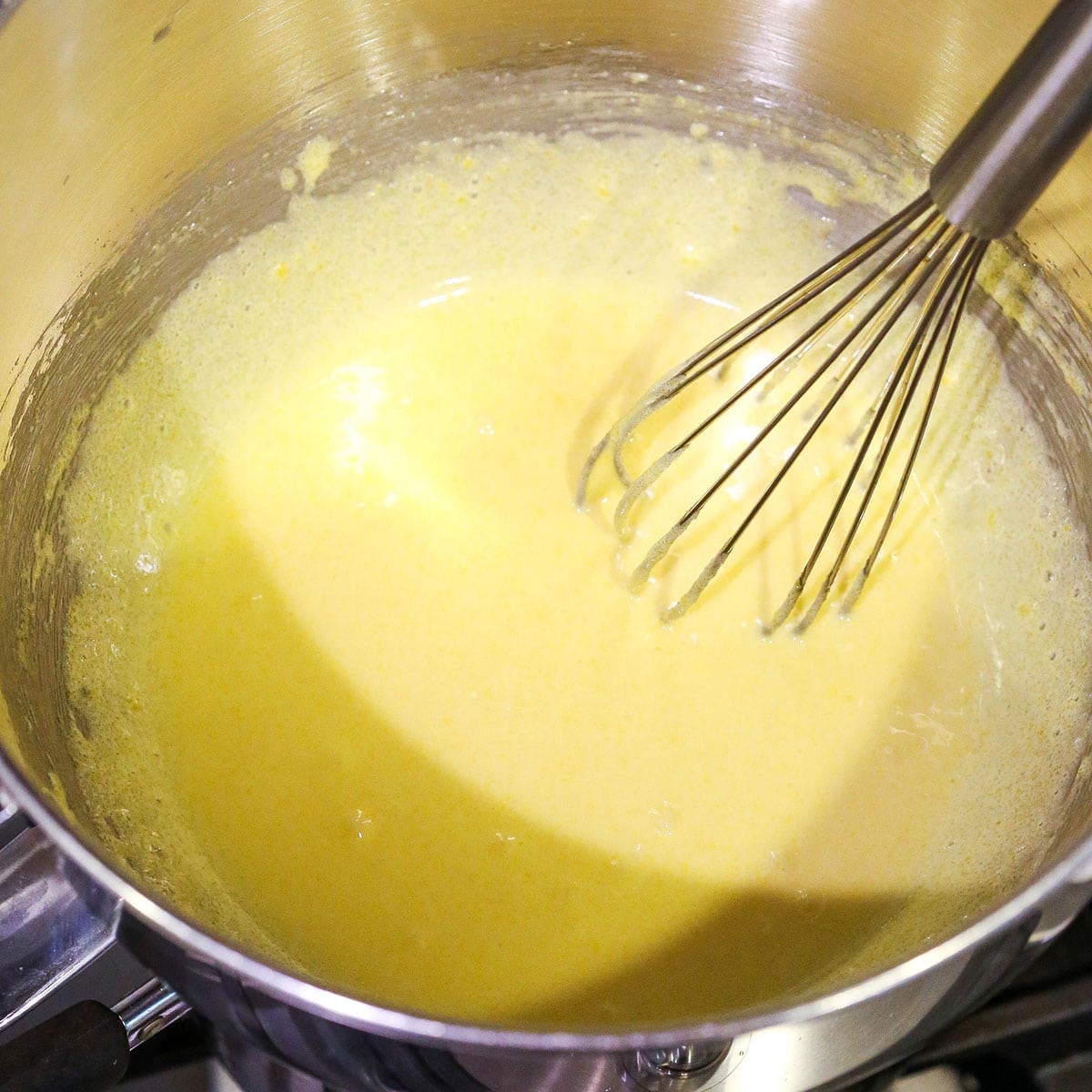 A step in making Easy Tiramisu showing the progression of the mixture as it cooks