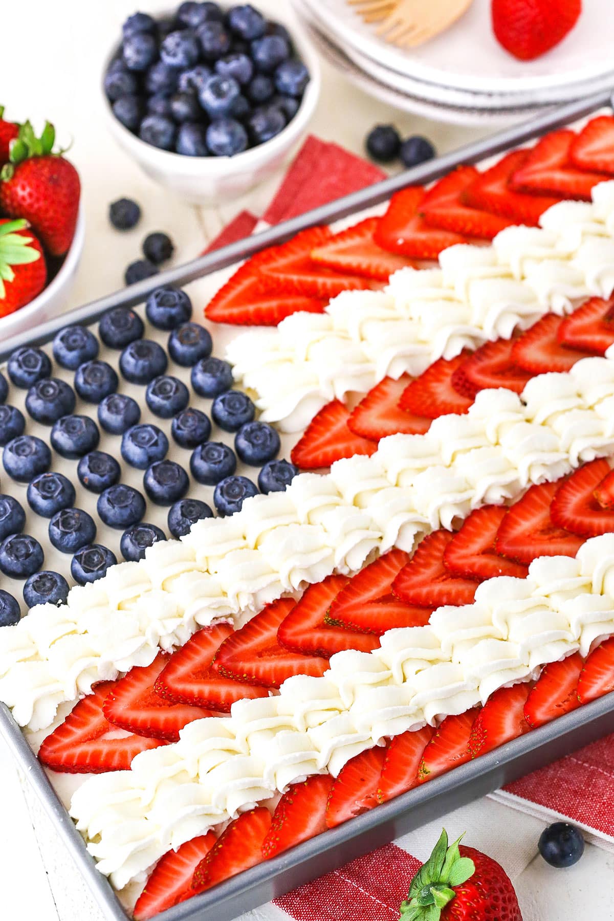 Angel Food Flag Cake in a gray cake pan on a white table