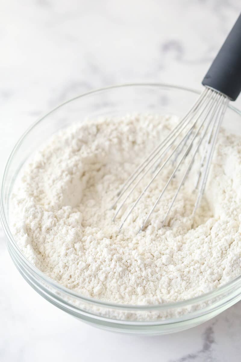 Whisking together dry ingredients for cake batter.