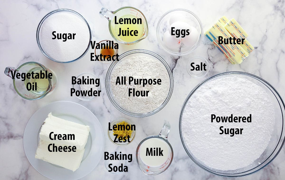 Ingredients for lemon layer cake separated into bowls.