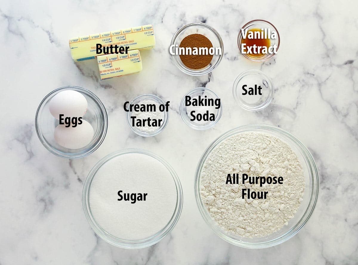 Ingredients for snickerdoodles separated into bowls.