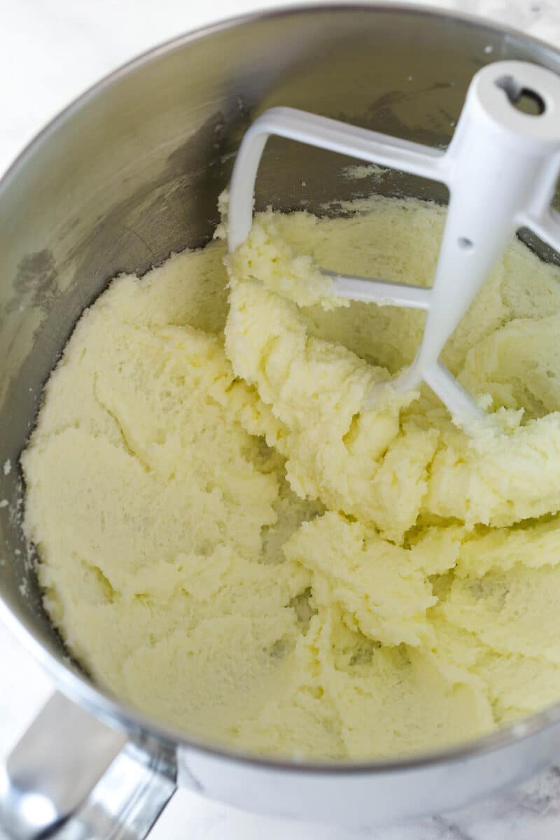 Creaming together butter and sugar for cookie dough.