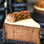 A slice of Guinness Chocolate Cheesecake on a black plate