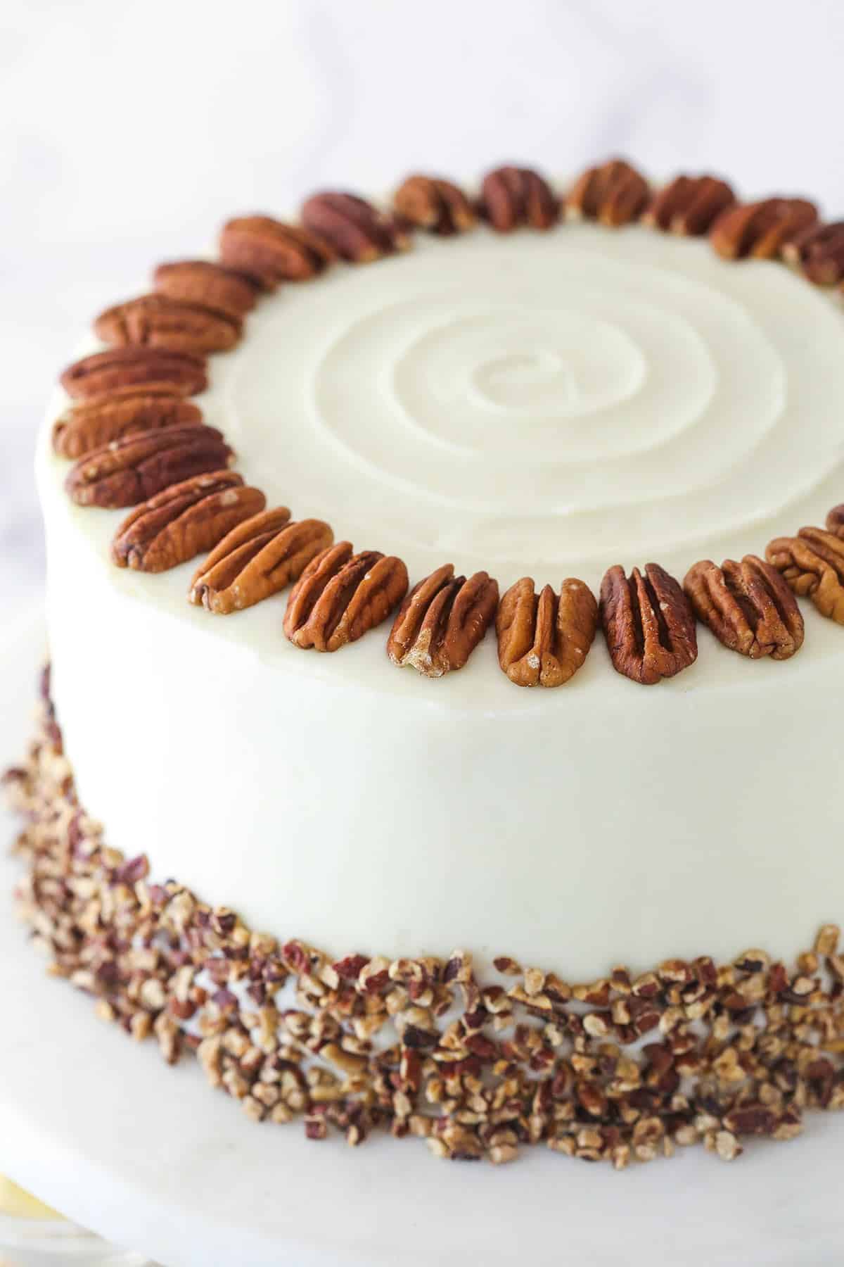 Closeup of hummingbird cake on a cake stand.