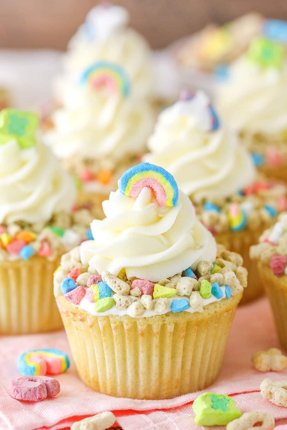 Lucky Charms Cupcakes on a light pink table cloth