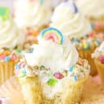 A Lucky Charms Cupcake with a bite removed