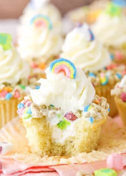 A Lucky Charms Cupcake with a bite removed