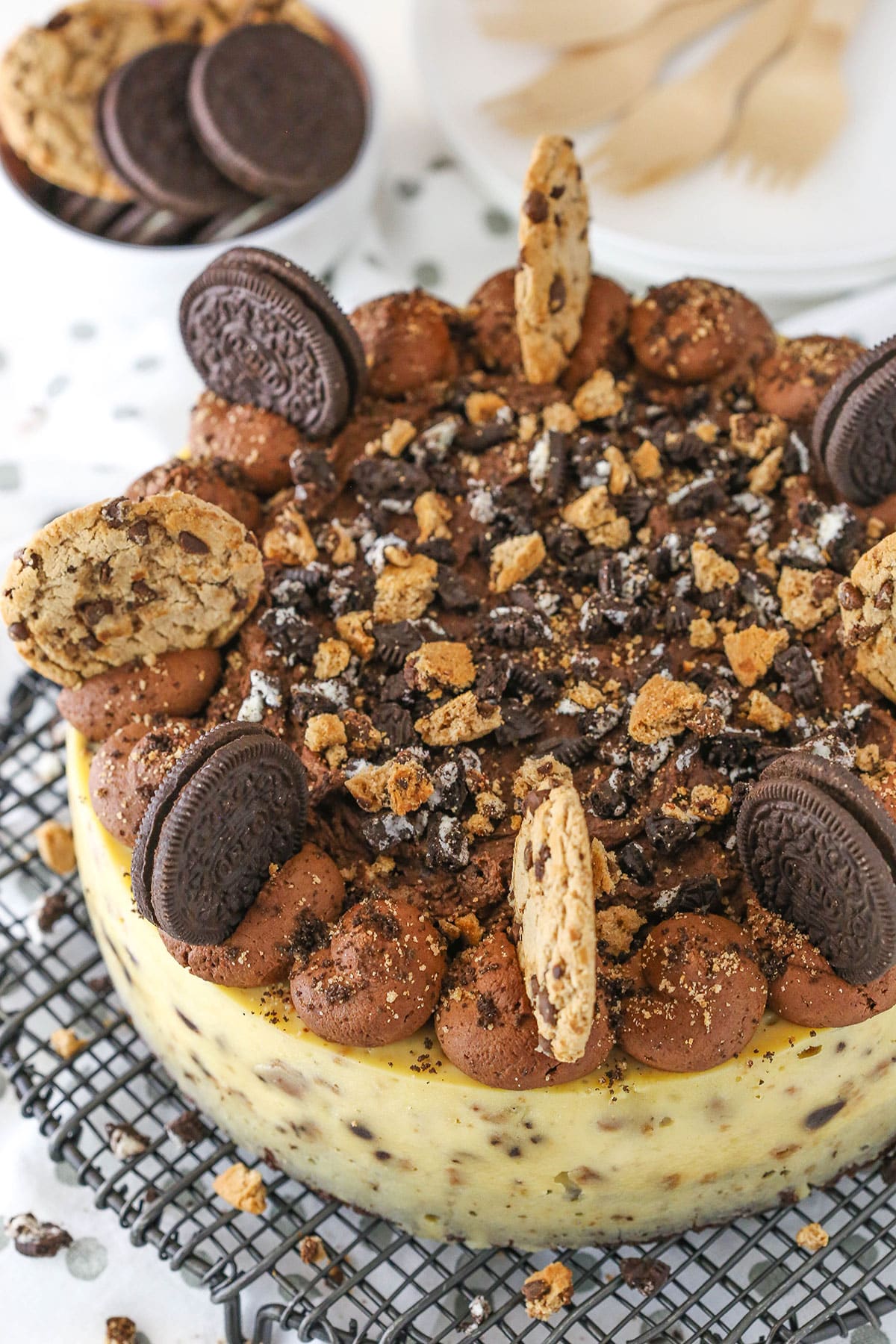 Overhead view of an Oreo Brookie Cheesecake on a metal cake stand