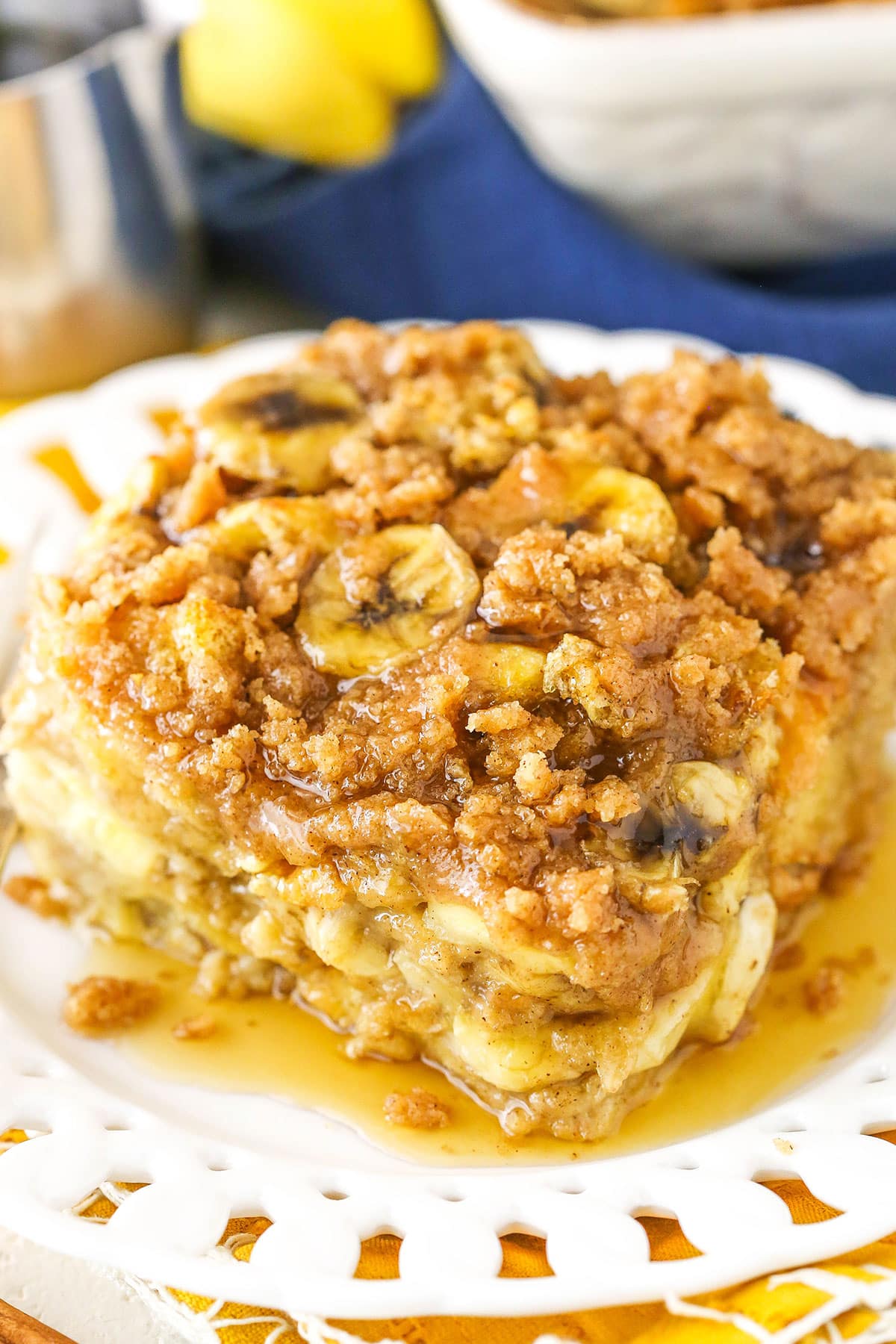 A serving of Overnight Baked Banana French Toast Casserole on a white plate